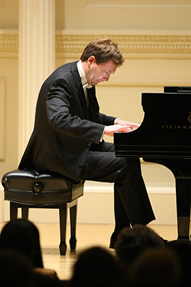  U.S. and European-trained classical concert pianist Yevgeny Morozov, based in Central New Jersey, has a wide and varied repertoire that includes the most challenging and technically demanding solo piano works. 
