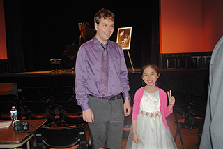 Piano Studio Gallery:  JENNIFER LIU with her teacher, pianist YEVGENY MOROZOV.