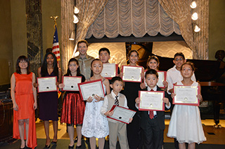  Piano performers, students of Yevgeny Morozov posing for the camera after the event. 