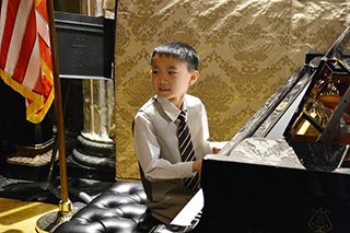  John is happy to pose pretending to play his Villa-Lobos toccata again.  